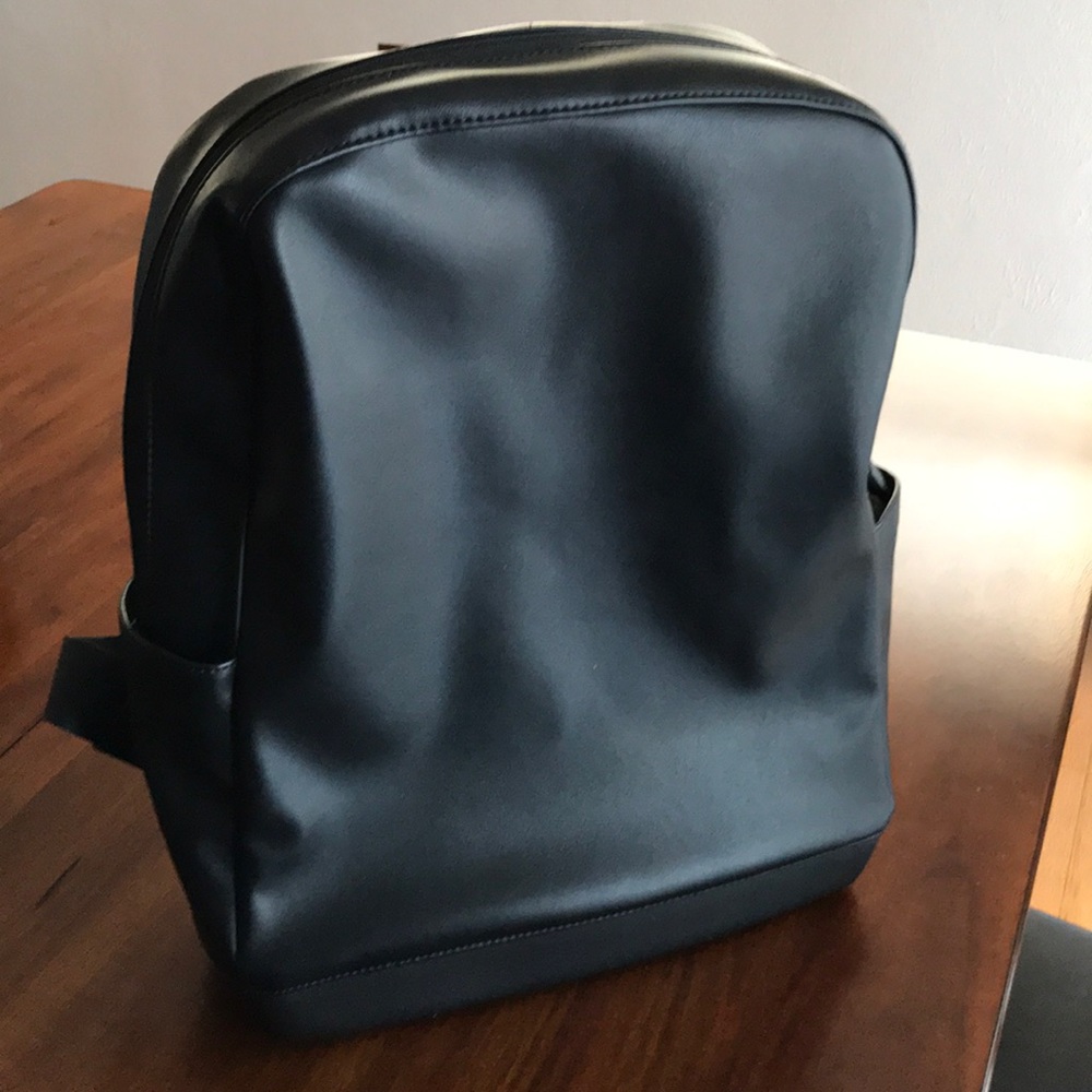 Black genuine leather Moleskine laptop bag